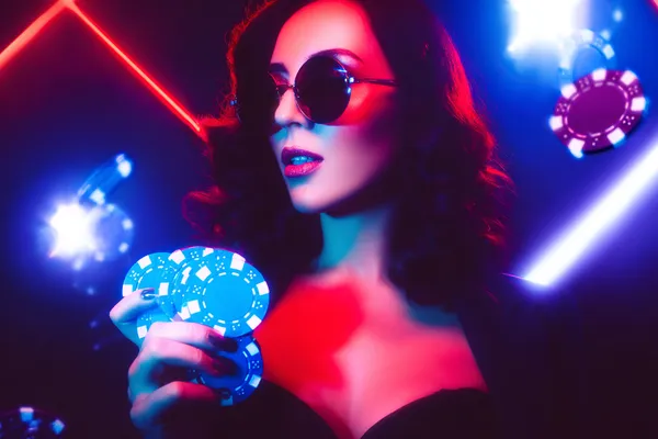 88FD Mobile Casino — Play anytime, anywhere A player using their smartphone during a festive local event, representing 88FD’s fully mobile-friendly casino.